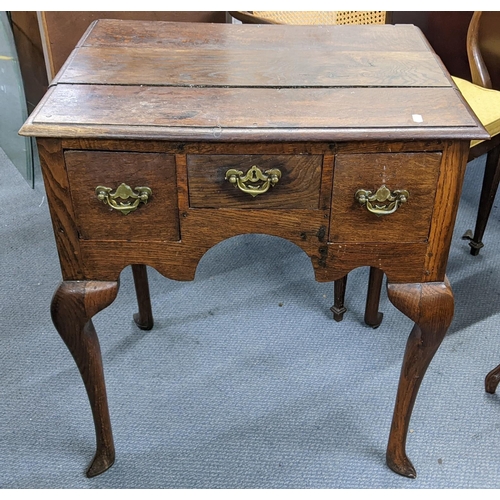 471 - An 18th century oak lowboy with three drawers on cabriole legs Location:LAB
If there is no condition... 