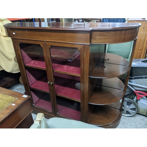 474 - A 20th century mahogany display side cabinet, twin glazed doors showing internal shelves, flanked by... 