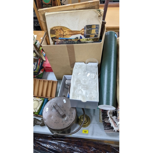 489 - A mixed lot to include framed pictures, rugs, tribal mask, clocks, books and other items Location:A2... 