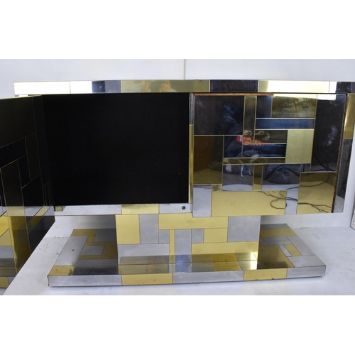 100A - A Paul Evans 'Cityscape' chromed steel and brass sideboard, produced by Directional, circa 1970, hav... 