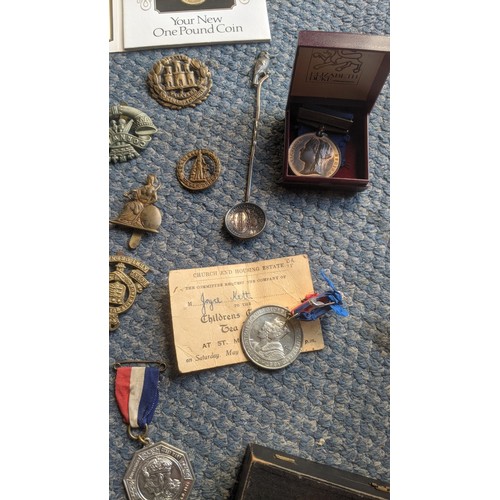 407 - A mixed lot of interest to include a cased set of 5 silver school medals and chain, a piece of cloth... 