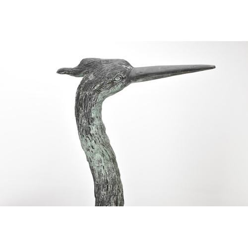 104 - Two 20th century large light green patinated cast bronze models of cranes, one mounted on a naturali... 