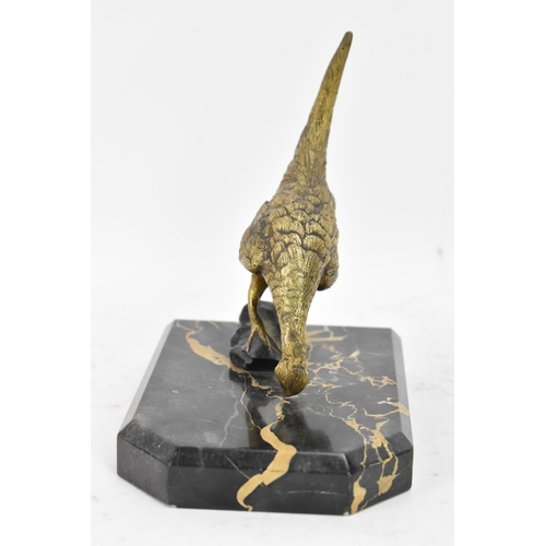 106 - After Antonio Amorgasti - A pair of 1930s bookends fashioned as gilded bronze models of pheasants on... 