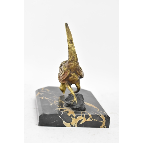 106 - After Antonio Amorgasti - A pair of 1930s bookends fashioned as gilded bronze models of pheasants on... 