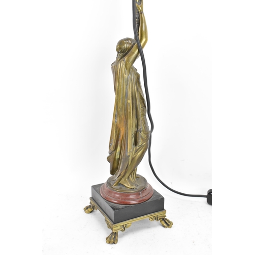 107 - A late 19th century French bronze figural table lamp, fashioned as a classical maiden holding a torc... 