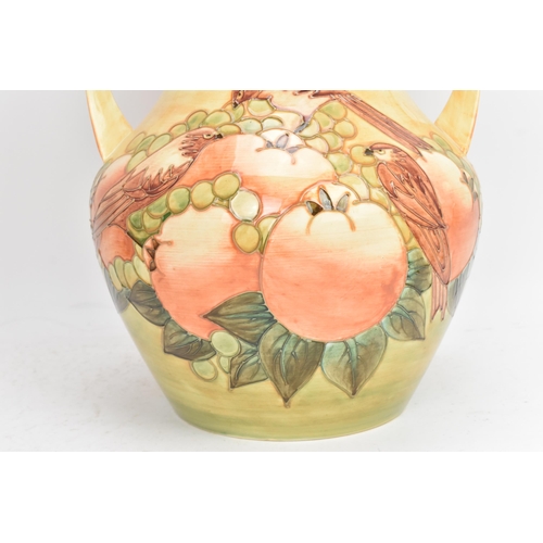 11 - A Moorcroft pottery large and impressive 'Finches Ochre' pattern twin handled vase, designed by Sall... 