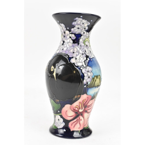 12 - A Moorcroft pottery trial piece seconds quality vase, of baluster form, decorated with birds in a co... 