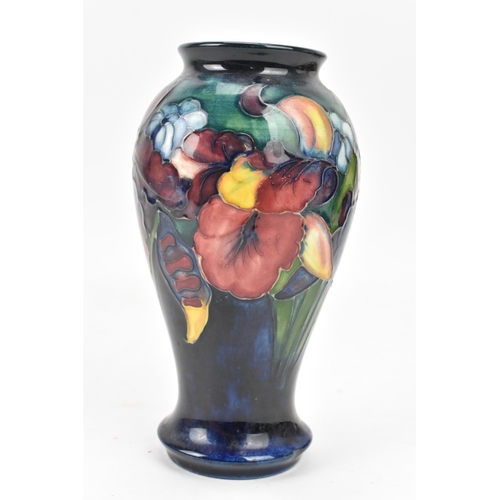 14 - A Walter Moorcroft pottery 'Orchid and Spring Flowers' pattern vase, of baluster form with everted r... 