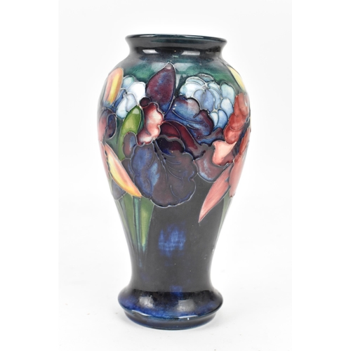 14 - A Walter Moorcroft pottery 'Orchid and Spring Flowers' pattern vase, of baluster form with everted r... 