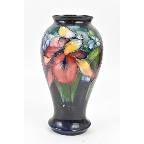 14 - A Walter Moorcroft pottery 'Orchid and Spring Flowers' pattern vase, of baluster form with everted r... 