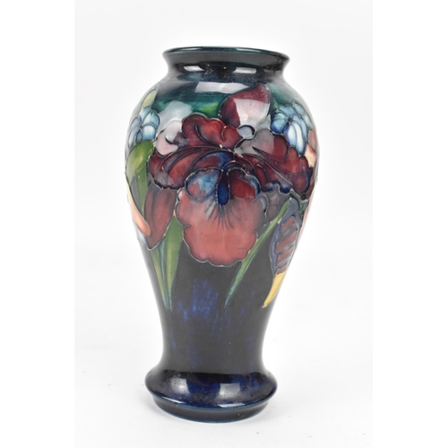 14 - A Walter Moorcroft pottery 'Orchid and Spring Flowers' pattern vase, of baluster form with everted r... 