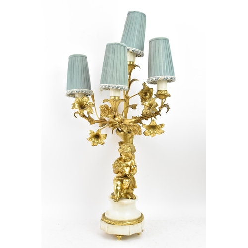 152 - A 19th century Louis XV style ormolu and marble table lamp, converted from a candelabrum, fashioned ... 