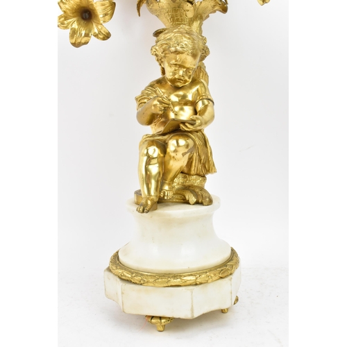 152 - A 19th century Louis XV style ormolu and marble table lamp, converted from a candelabrum, fashioned ... 