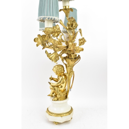 152 - A 19th century Louis XV style ormolu and marble table lamp, converted from a candelabrum, fashioned ... 