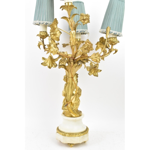 152 - A 19th century Louis XV style ormolu and marble table lamp, converted from a candelabrum, fashioned ... 