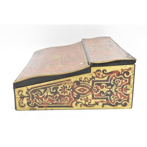 158 - A late 19th century French boulle work writing slope box, the exterior having brass cartouche to the... 