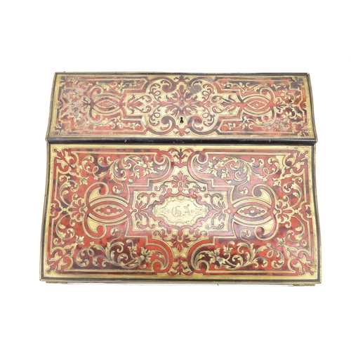 158 - A late 19th century French boulle work writing slope box, the exterior having brass cartouche to the... 