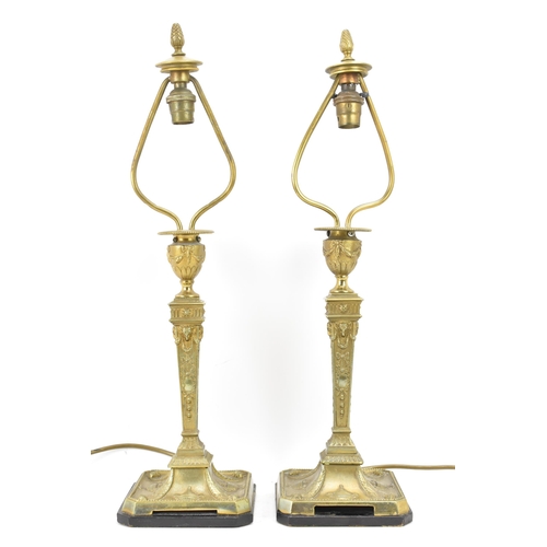 159 - Railwayana interest - A pair of early 20th century Pullman brass table lamps, each in the neo classi... 