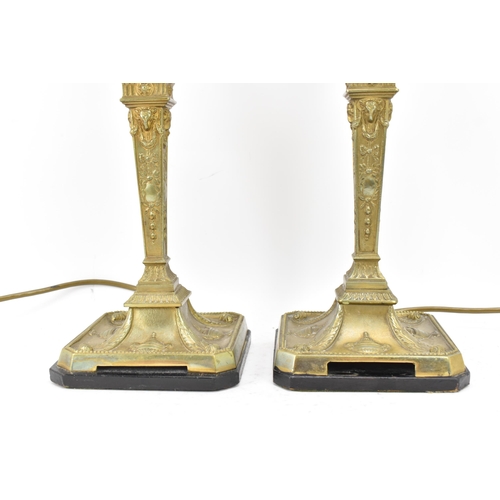 159 - Railwayana interest - A pair of early 20th century Pullman brass table lamps, each in the neo classi... 