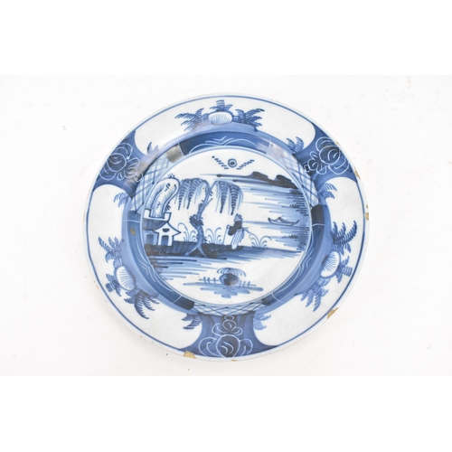 162 - A set of four 18th century English delft plates, circa 1760, decorated in the Chinese manner, each p... 