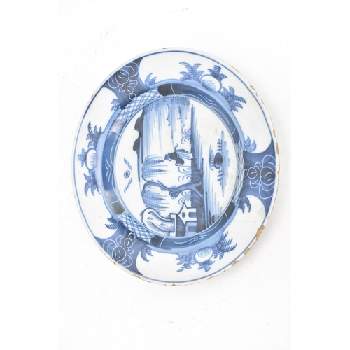 162 - A set of four 18th century English delft plates, circa 1760, decorated in the Chinese manner, each p... 