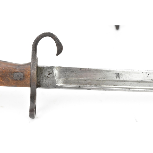 170 - An early 20th century Japanese type 30 Arisaka Bayonet, with wooden grips, hooked J shaped quillon a... 