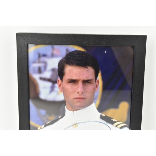 173 - A Tom Cruise signed colour photograph, the image depicting the actor in costume as Maverick from the... 