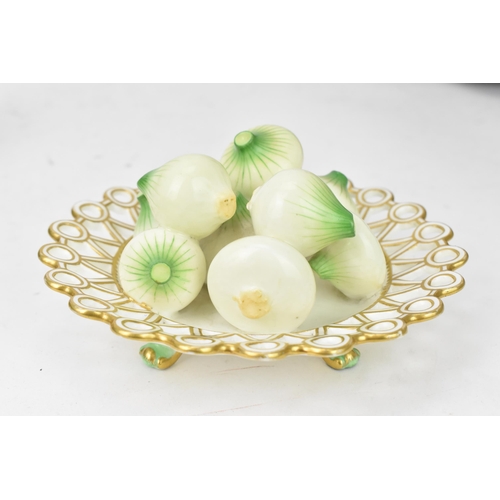 176 - A Victorian Minton trompe-l'oeil dish, circa 1845, the centre of the footed and pierced gilt-edged d... 