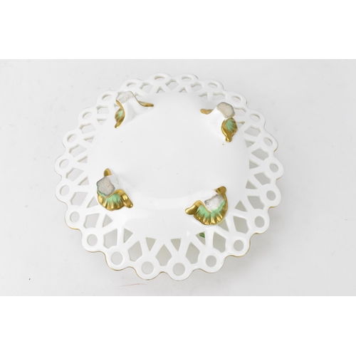 176 - A Victorian Minton trompe-l'oeil dish, circa 1845, the centre of the footed and pierced gilt-edged d... 