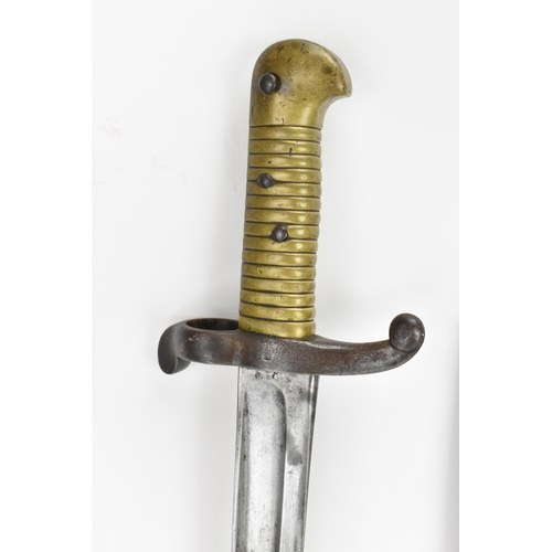 182 - A 19th century French model 1842 Bayonet, with brass handle, steel cross guard and muzzle ring, hous... 