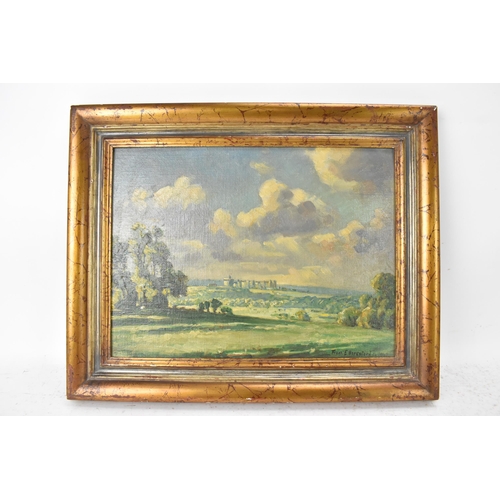 211 - Frank Ernest Beresford (1881-1967) - An oil on board depicting a landscape scene with Windsor castle... 