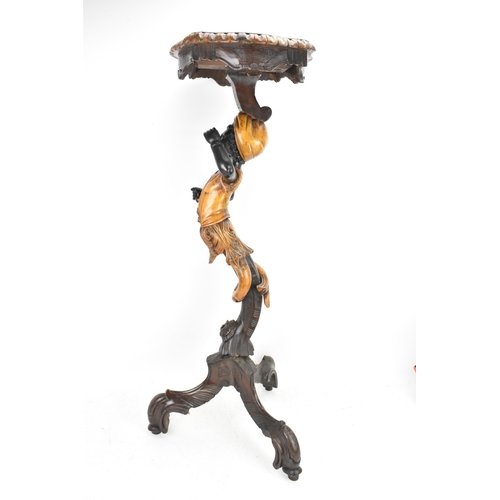 225 - A late 19th/early 20th century Italian blackamoor ebonised torchere bust/plant stand, shaped top wit... 