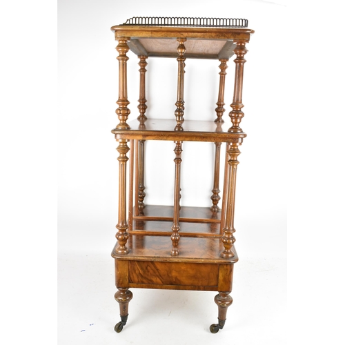 226 - A Victorian figured burr walnut three tier whatnot, having a gilt metal gallery top above three tier... 