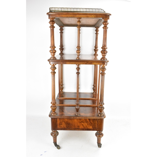 226 - A Victorian figured burr walnut three tier whatnot, having a gilt metal gallery top above three tier... 