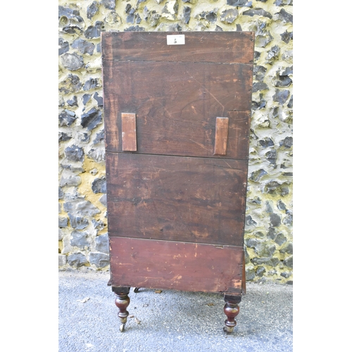 227 - A Victorian mahogany waterfall music sheet cabinet, having two open tiers with eleven fitted section... 