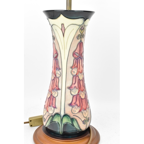 23 - A Moorcroft pottery 'Foxglove' pattern table lamp, designed by Rachel Bishop, of ovoid form tube lin... 