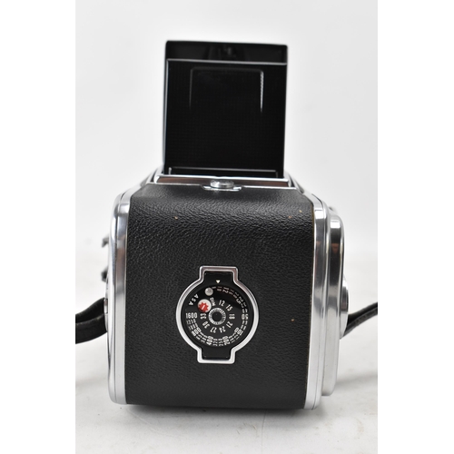 237 - A Hasselblad 500C chrome and black leatherette cased camera, with a Carl Zeiss Synchro Compur 80mm f... 