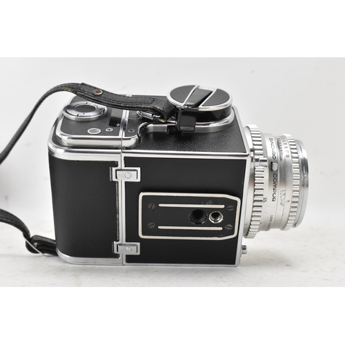 237 - A Hasselblad 500C chrome and black leatherette cased camera, with a Carl Zeiss Synchro Compur 80mm f... 