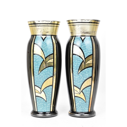 24 - Two HEM 1930s Czechoslovakian glass vases, each of ovoid form and decorated in silver lustre and tur... 