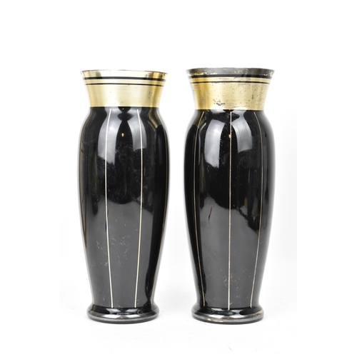 24 - Two HEM 1930s Czechoslovakian glass vases, each of ovoid form and decorated in silver lustre and tur... 