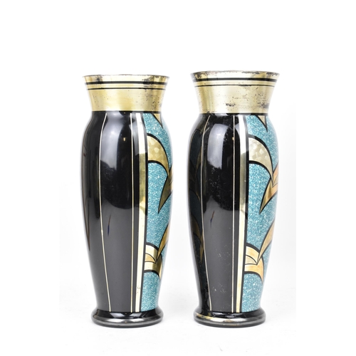 24 - Two HEM 1930s Czechoslovakian glass vases, each of ovoid form and decorated in silver lustre and tur... 