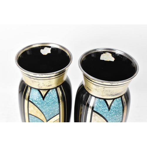 24 - Two HEM 1930s Czechoslovakian glass vases, each of ovoid form and decorated in silver lustre and tur... 