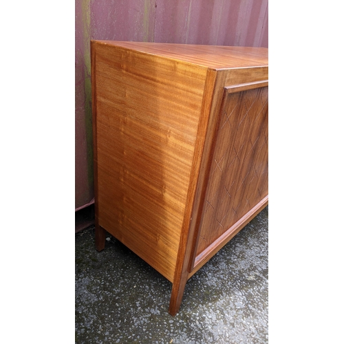 245 - A Gordon Russell 1950s double helix sideboard designed by David Booth and Judith Ledeboer having two... 