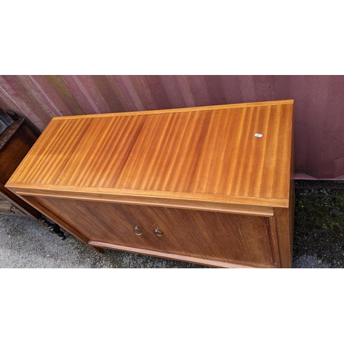 245 - A Gordon Russell 1950s double helix sideboard designed by David Booth and Judith Ledeboer having two... 