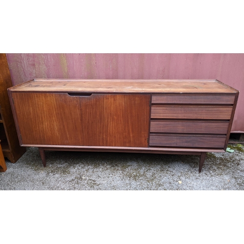 249 - Richard Hornby for Fyne Ladye - A mid 20th century afromosia teak sideboard, having a straight top w... 