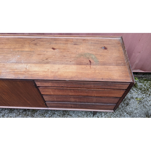 249 - Richard Hornby for Fyne Ladye - A mid 20th century afromosia teak sideboard, having a straight top w... 