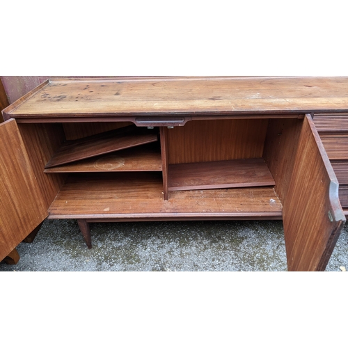 249 - Richard Hornby for Fyne Ladye - A mid 20th century afromosia teak sideboard, having a straight top w... 