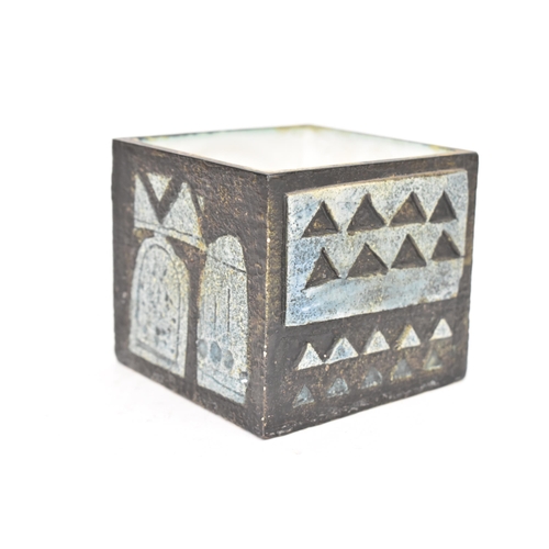 25 - A Troika pottery cube vase, by Honor Curtis, circa 1969-73, with relief and incised decoration to ea... 