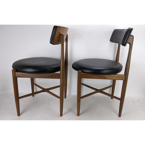 252 - Victor B Wilkins for G Plan - A set of four 1960s 'Fresco' range teak dining chairs having black lea... 