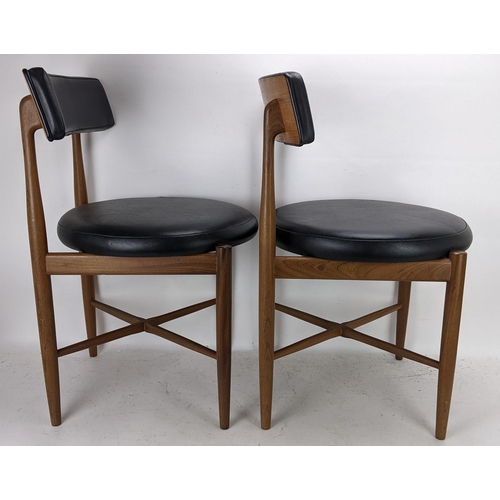 252 - Victor B Wilkins for G Plan - A set of four 1960s 'Fresco' range teak dining chairs having black lea... 